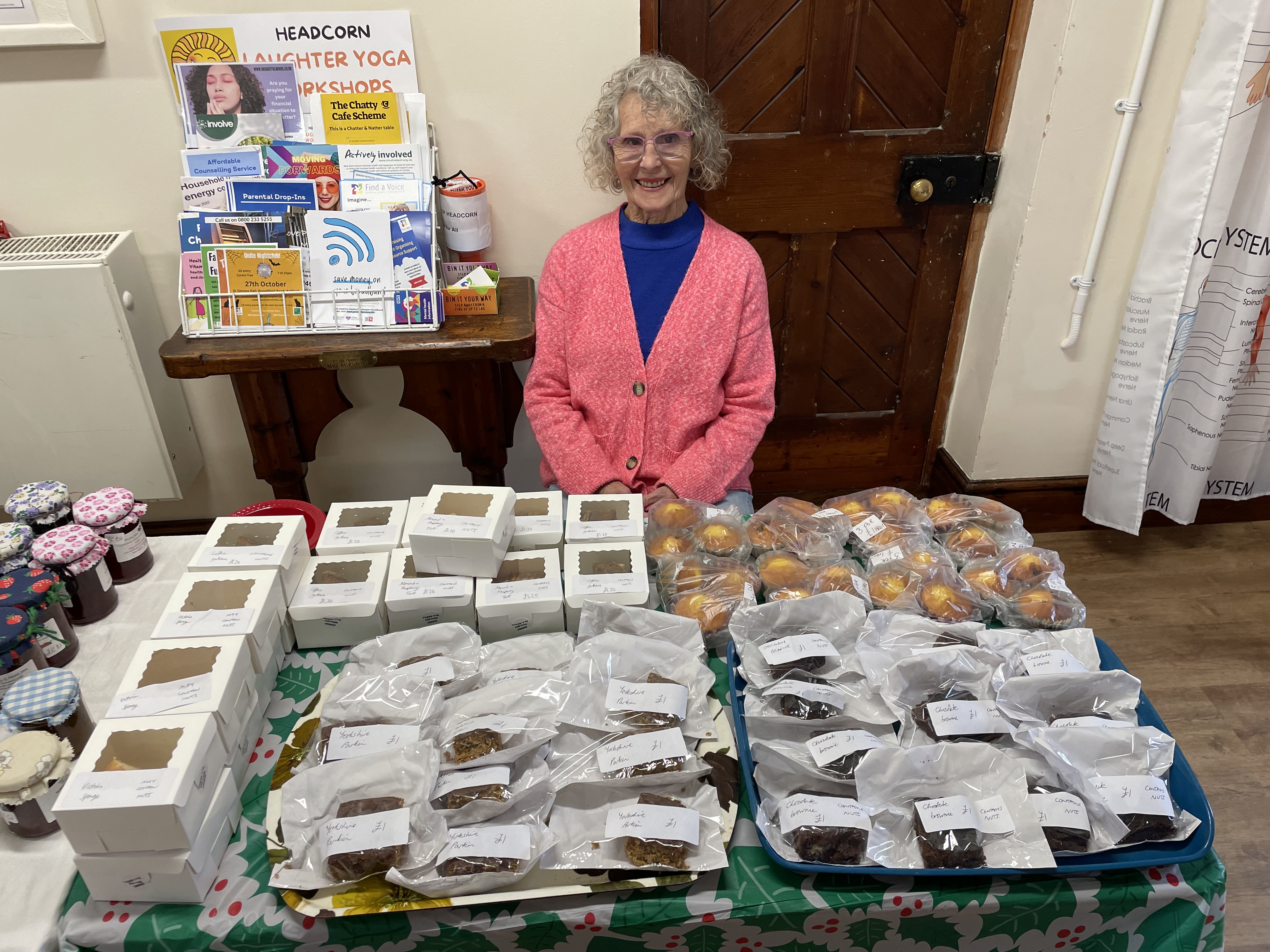 Volunteer Beryl on the homemade cakes and jam stall